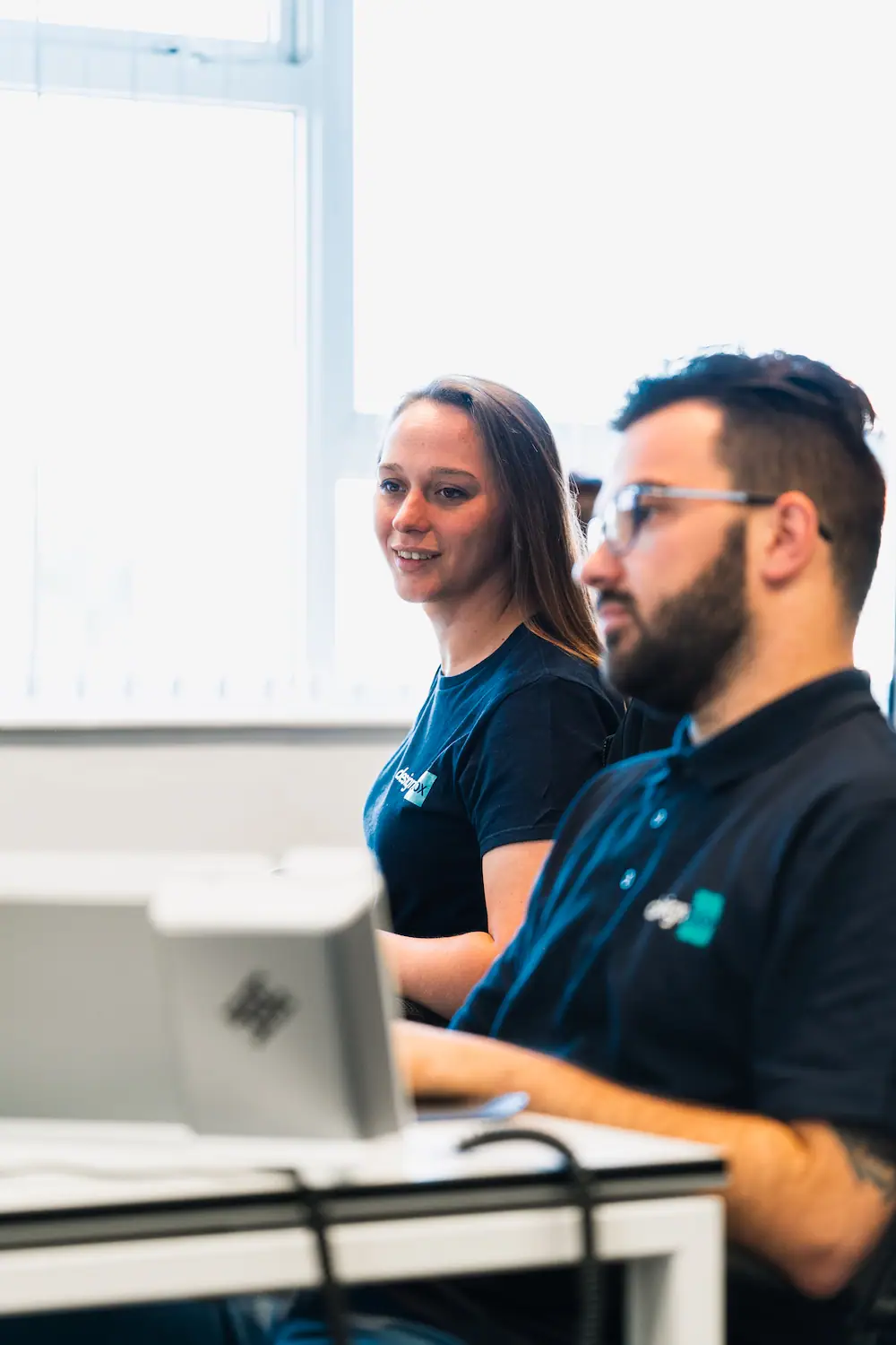 A designbox team member working on a client website