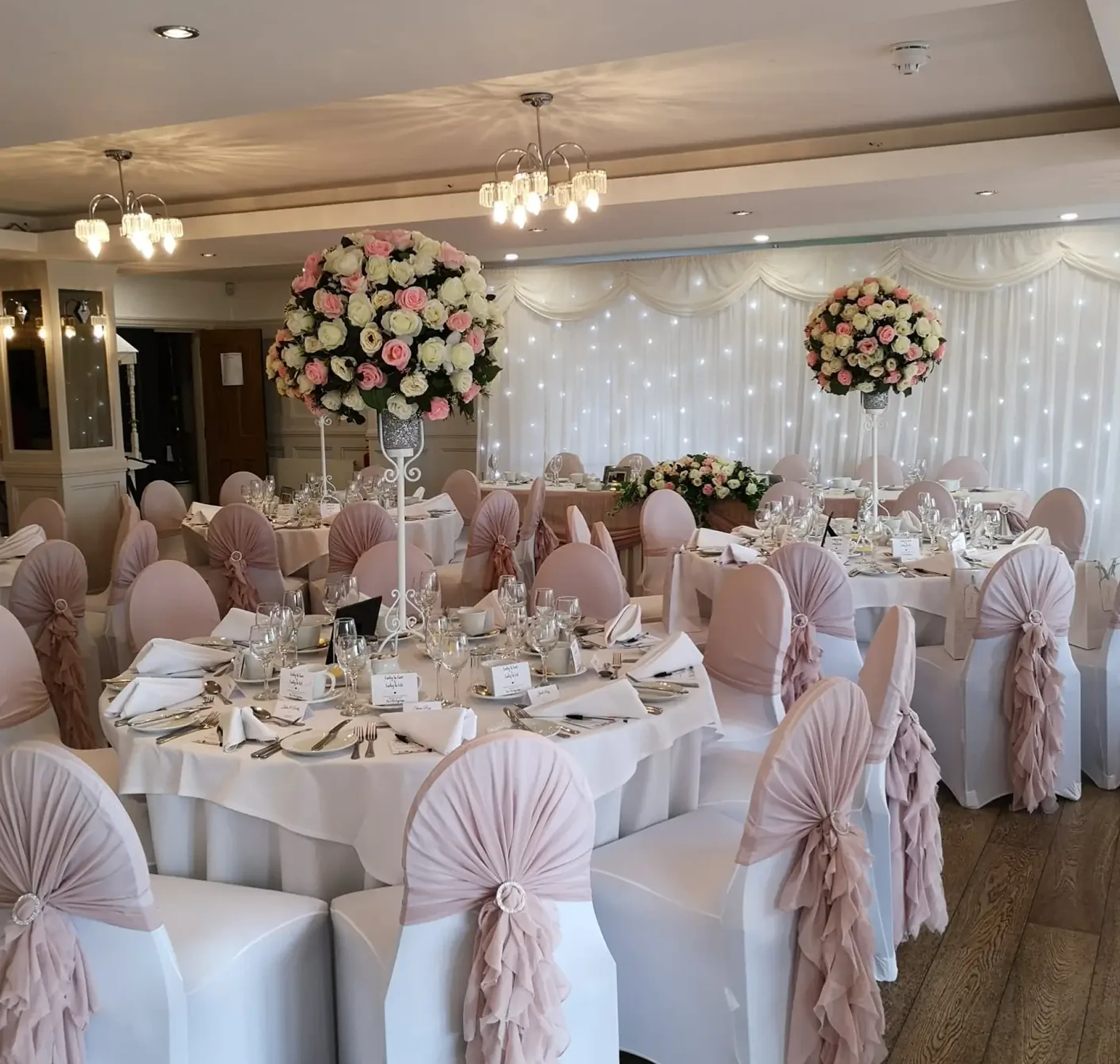 A reception suite dressed for a wedding at The Rayleigh Club